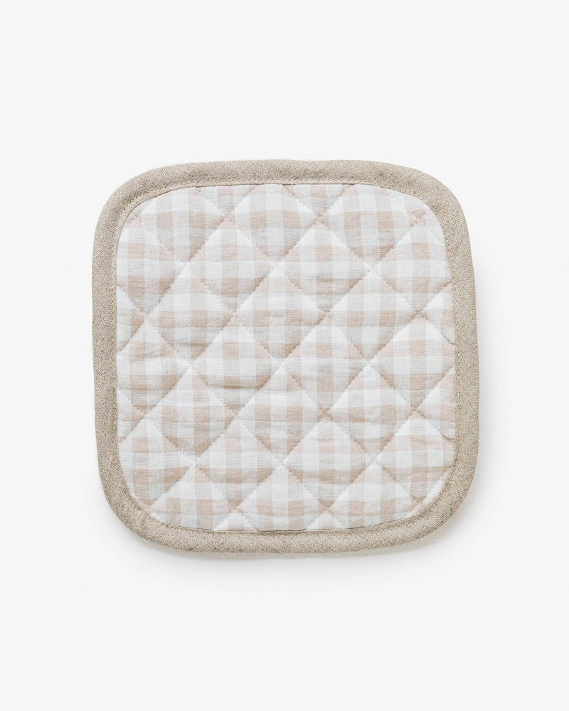MagicLinen - Linen pot-holder with quilted detailing, showcasing heat-insulating padding and a hanging loop, perfect for stylish and practical kitchen use.