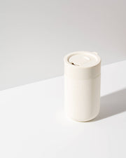 W&P - Ceramic Reusable Coffee Mug 16oz: Charcoal, featuring a durable ceramic body with a matte silicone sleeve and a splash-resistant lid. Ideal for eco-conscious coffee lovers.