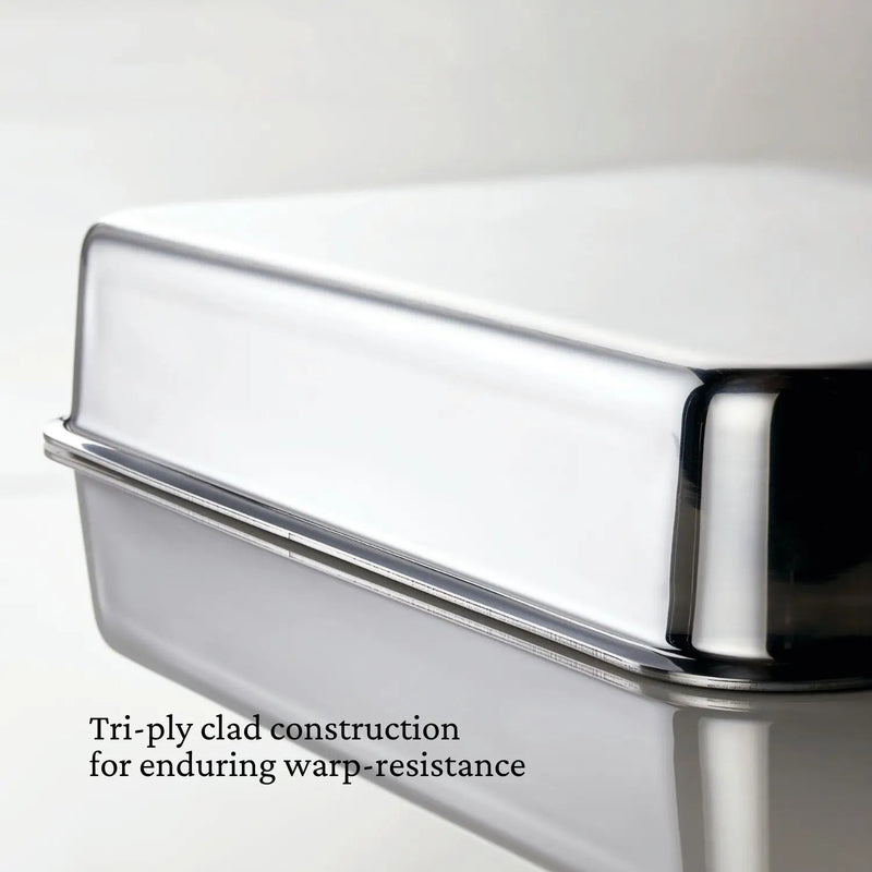 Hestan | Oven Bond Tri-Ply Bakeware, Rectangular Baker with tri-ply clad construction and curved handles, highlighting durability and heat distribution for baking and roasting.