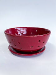 RachaelPots - Large Berry Bowl With Dish: Black, a hand-thrown ceramic colander with drainage holes and matching saucer, perfect for rinsing or displaying fruits.