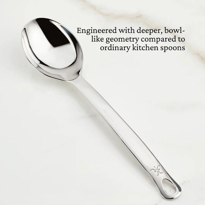 Stainless Steel Deep Spoon, 13, displayed on a marble surface, showcasing its sleek design. Perfect for enhancing your kitchen collection from Athens Cooks.