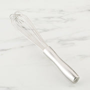 Hestan Provisions | Stainless Steel French Whisk, 9 on marble surface, showcasing its polished finish and ergonomic design, ideal for precise whisking and mixing tasks.