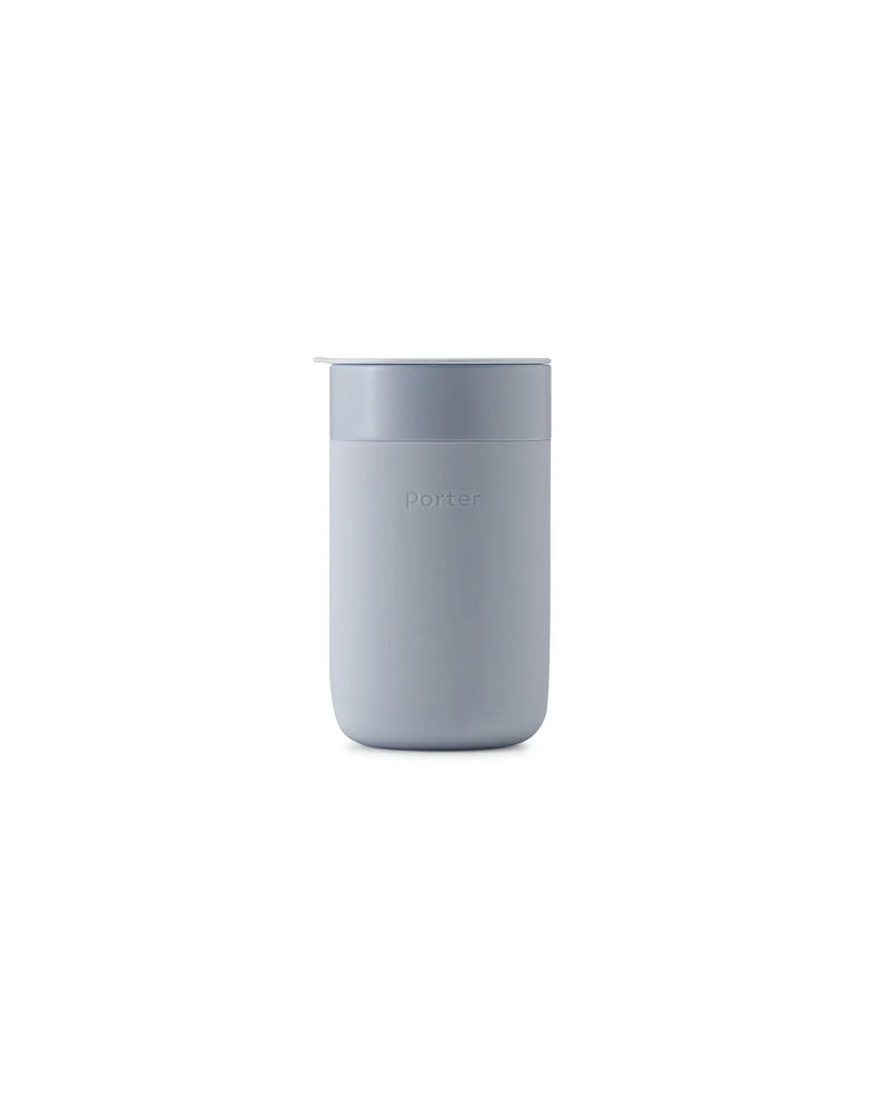 W&P - Reusable Ceramic Mug: Terrazzo Blush / 16 oz, featuring a white ceramic body with a splash-resistant lid, ideal for eco-friendly beverage enjoyment.