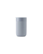 Reusable Ceramic Mug with lid, featuring a splash-resistant design and silicone sleeve for grip. Ideal for reducing waste; microwave and dishwasher safe.