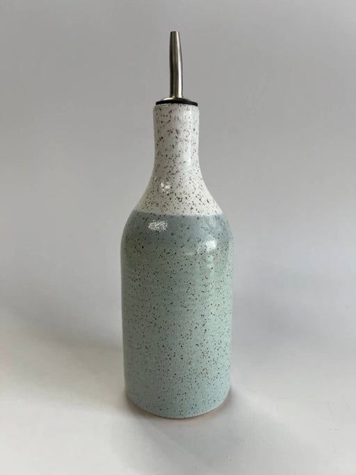 RachaelPots - Oil Cruet Large: Nude/White, featuring a ceramic body with a metal spout, ideal for controlled olive oil pouring.