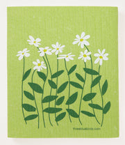 Three Bluebirds Swedish Dishcloths - Daisies on Green: white flowers and green leaves design, eco-friendly, replaces paper towels, biodegradable, perfect for sustainable kitchen use.