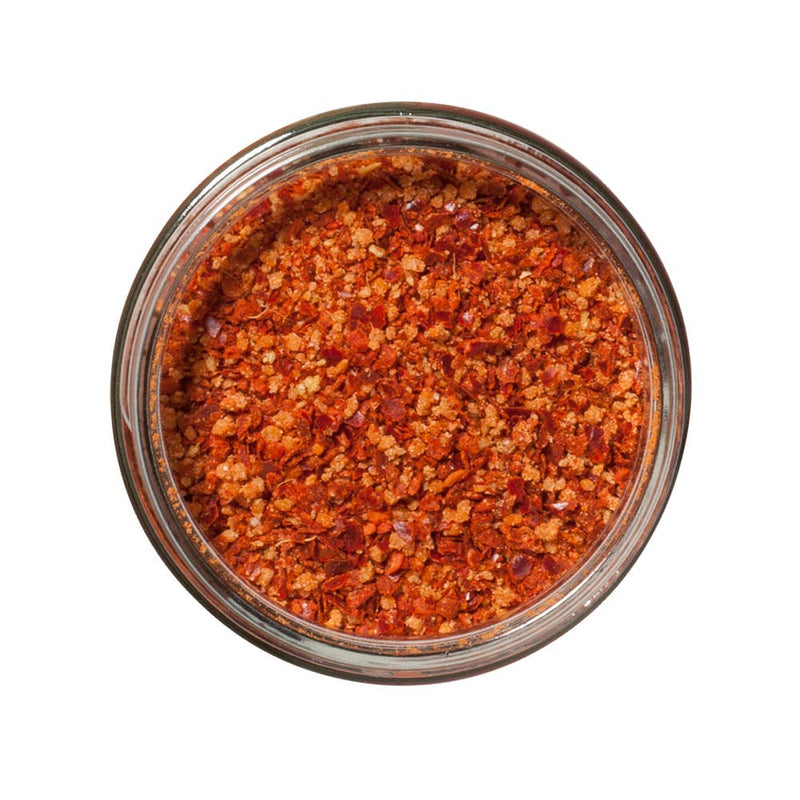 San Juan Island Sea Salt - Kimchi Seasoning Blend in a glass jar, featuring crushed red chili-pepper flakes with gochugaru, garlic, and ginger for tangy, mildly spicy flavor.
