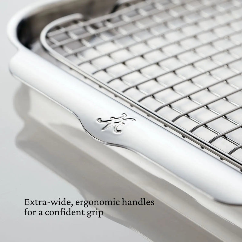Hestan Provisions | OvenBond Tri-Ply Bakeware, Medium Sheet Pan with Rack features ergonomic handles and a wire-grid surface on a shallow tray for efficient roasting.