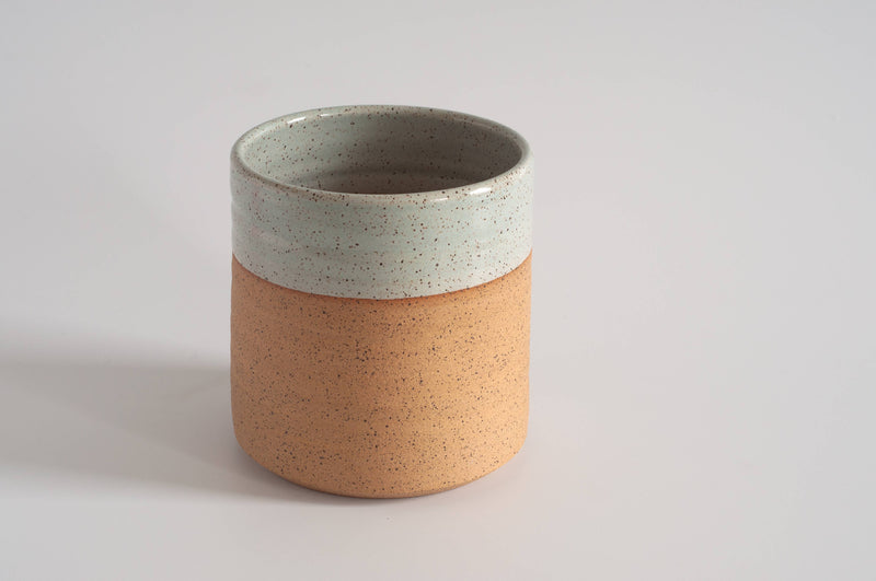 RachaelPots - Kitchen Utensil Holder: Sage, a handcrafted terracotta vessel with a speckled pale-green glaze, perfect for organizing utensils. Made in Brooklyn, microwave and dishwasher safe.