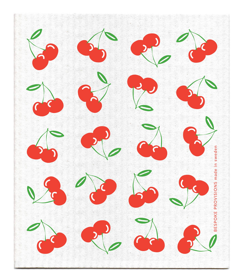 Bespoke Provisions - Cherries Swedish Dishcloth featuring a pattern of red cherries and green leaves, designed for eco-friendly cleaning.