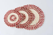 NEEPA HUT - Hand Woven Placemat Set in red and natural hues, crafted from heat-resistant seagrass, offering versatile use as chargers, trivets, or decor.