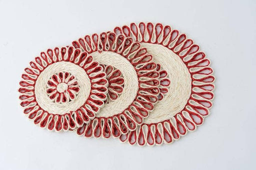 NEEPA HUT - Hand Woven Placemat Set in red and natural hues, crafted from heat-resistant seagrass, offering versatile use as chargers, trivets, or decor.
