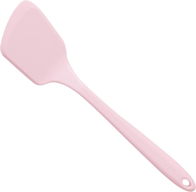 GIR | Ultimate Spatula - Light Pink: Premium silicone spatula designed for versatile cooking, featuring a flexible, firm blade ideal for maneuvering food and protecting cookware.