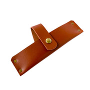 Lamson leather sheath for 7.25 meat cleaver, featuring gold rivets and a strap, designed for safe storage and transport.