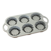 Nordic Ware | Shortcake Baskets Pan featuring six detailed molds for creating basket-shaped shortcakes or gelatin desserts, ideal for special occasions.