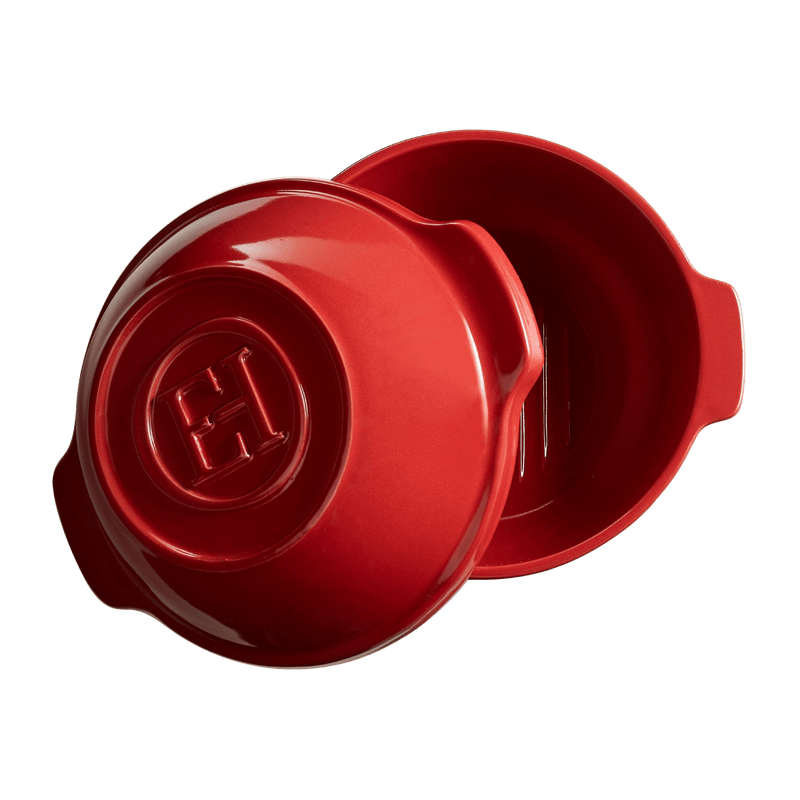Emile Henry Bread Pot with lid, showcasing its versatile design for even heat distribution, ideal for baking bread or roasting vegetables, handcrafted in France.