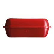 Emile Henry Loaf Bread Baker in Burgundy, featuring a lidded design for artisan-style baking with steam-trapping ceramic walls, ridged base, and easy-grip handles.