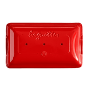 Emile Henry Baguette Baker, a red rectangular bakeware piece, ideal for creating artisan baguettes, reflecting Athens Cooks' focus on quality kitchen tools.