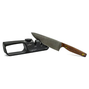 Lamson Adjustable Handheld Knife Sharpener in use, featuring an ergonomic design with a black knob for precise sharpening of kitchen knives and shears.