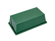 Great Jones | Breadwinner - Raspberry loaf pan with text, featuring a wavy, nonstick, ceramic-coated surface for easy release of baked goods.