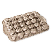 Nordic Ware | Bundt® Tea Cakes and Candies Pan featuring 30 detailed mini Bundt shapes for making delightful treats.