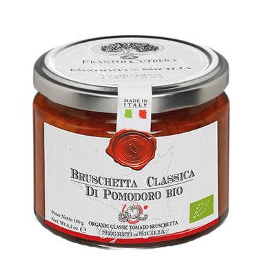 The French Farm - Frantoi Cutrera Organic Classic Tomato Bruschetta 6.7oz jar, featuring organic tomato spread made in Italy, ideal for bread or as a sauce.