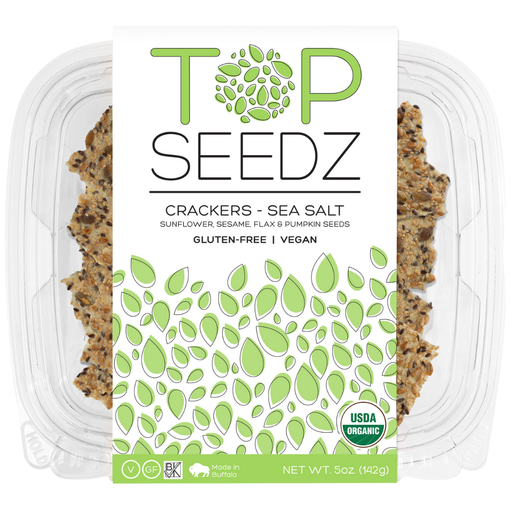 Top Seedz Sea Salt Crackers in a plastic container, featuring a white and green label, highlighting the flagship 5oz product with a satisfying crunch.