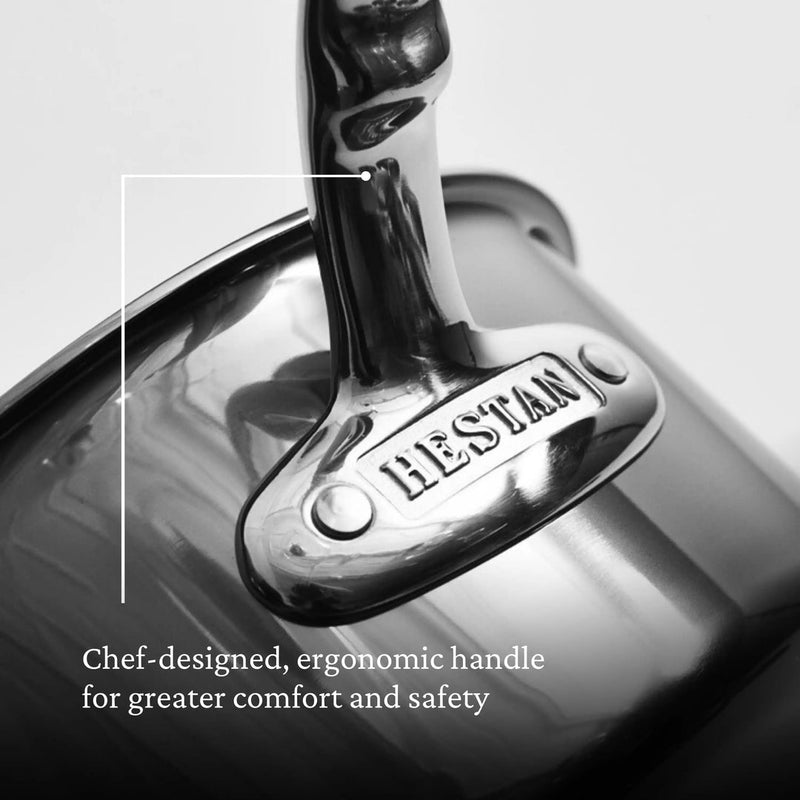 Hestan | Cookware, 1.5qt Saucepan + Lid stainless-steel handle with “HESTAN” stamp, highlighting a chef-designed ergonomic grip for comfort and safety.