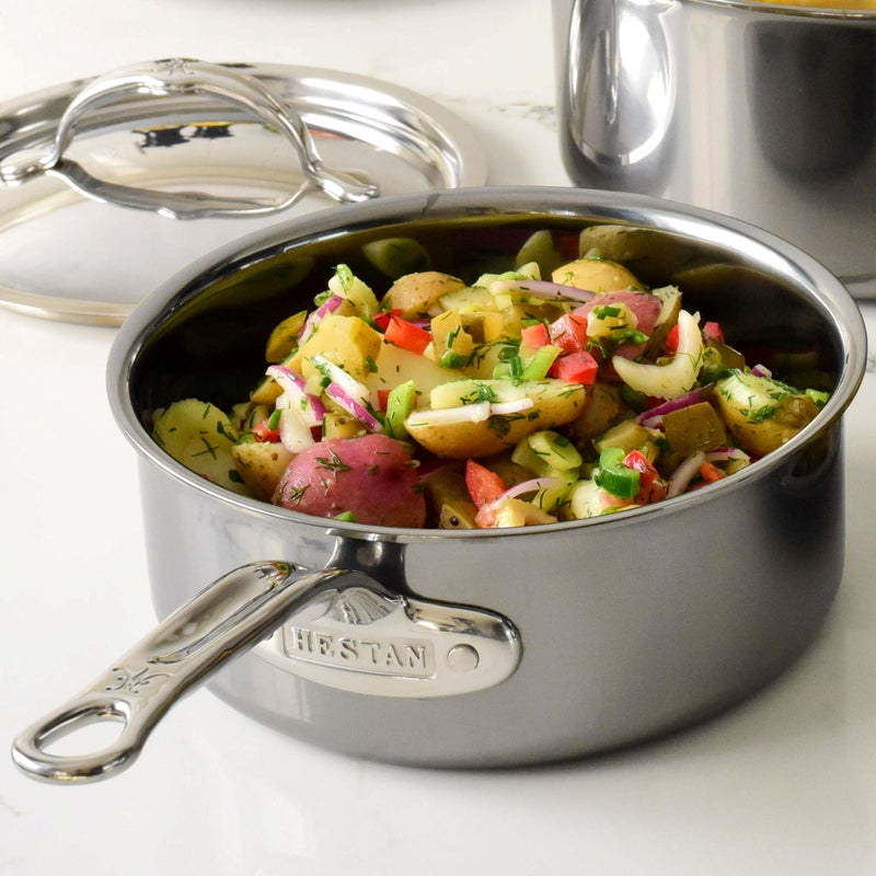 Hestan NanoBond | Cookware, 2qt Saucepan + Lid on countertop, filled with potato salad; showcasing its durable, sleek titanium-bonded stainless-steel design and ergonomic handle.