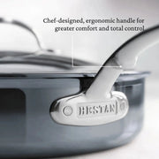 Hestan | Cookware, 3.5qt Sauté Pan + Lid features a chef-designed, ergonomic handle with HESTAN stamped, highlighting comfort and control for versatile cooking.