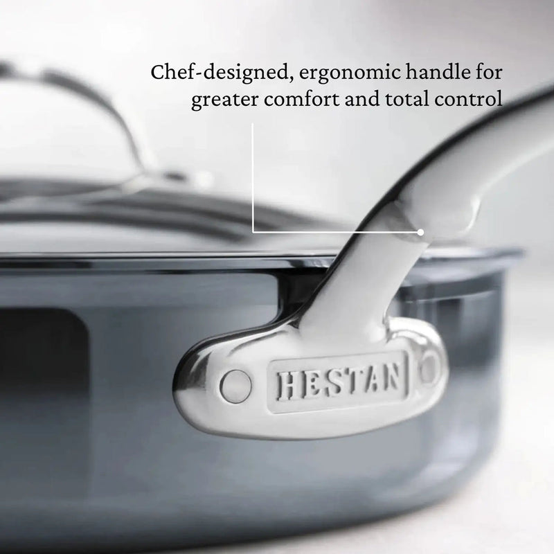 Hestan | Cookware, 3.5qt Sauté Pan + Lid features a chef-designed, ergonomic handle with HESTAN stamped, highlighting comfort and control for versatile cooking.