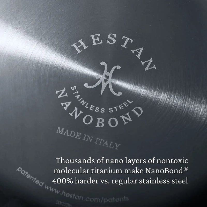 Hestan | Cookware, 3.5qt Sauté Pan + Lid, underside view showcasing NanoBond stainless steel, Hestan logo, and Italian craftsmanship details.
