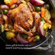 Hestan | Molecular Titanium Stainless Wok, 14 holding a whole roast chicken with vegetables, demonstrating its versatility and high-heat capability, ideal for diverse cooking methods.