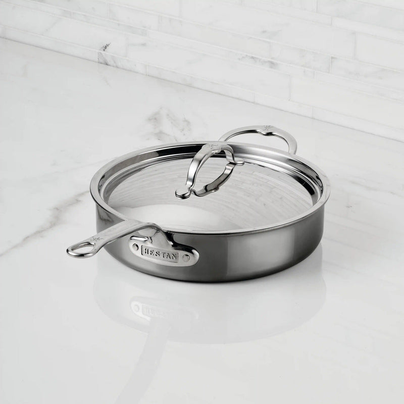 Hestan | Cookware, 3.5qt Sauté Pan + Lid on a countertop, showcasing its ergonomic handles and durable stainless steel with titanium nano-layers.