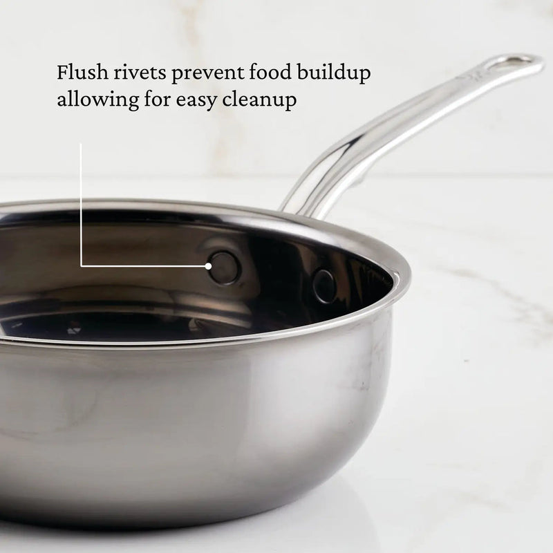 Hestan | Cookware, 2qt Saucier Pan + Lid features flush rivets for easy cleanup and a polished handle, ideal for sauces and whisking.