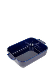 Peugeot | Appolia Rectangular Baking Dish, Blue; a durable, navy stoneware with integrated handles, ideal for even cooking and easy serving.