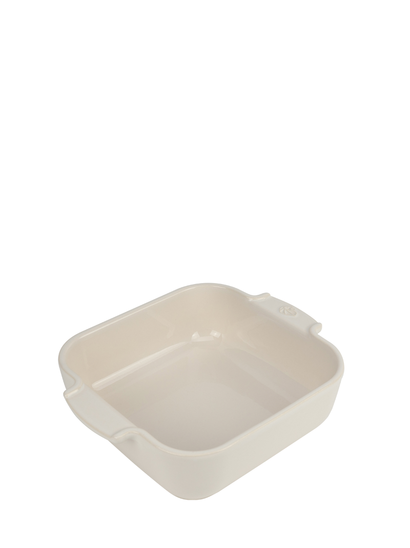 Peugeot | Appolia Square Baking Dish 8 inches, Ecru, ideal for even cooking. Features integrated handles for easy handling, perfect for casseroles or gratins.