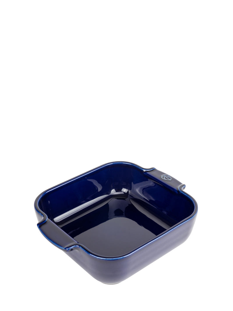 Peugeot | Appolia Square Baking Dish 8 inches, Blue features a deep-blue ceramic design with flared handles, ideal for even cooking and easy handling.