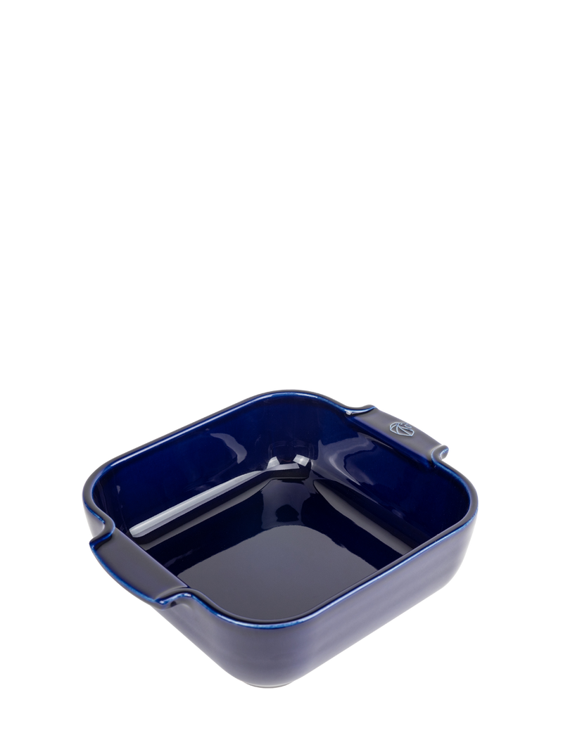 Peugeot | Appolia Square Baking Dish 8 inches, Blue: A navy ceramic dish with deep rims, rounded corners, and integrated handles, ideal for oven-baked meals for two.