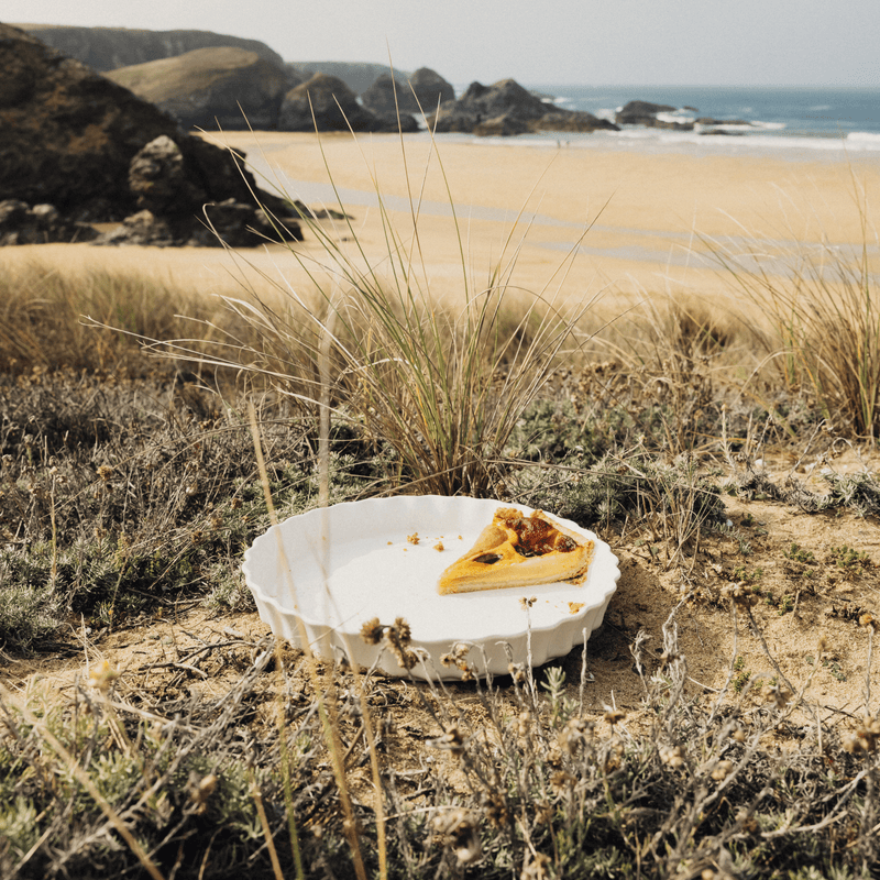 Emile Henry | Deep Flan & Tart Dish, 1.3QT / Cedar in coastal dunes, showcasing its rustic elegance and premium craftsmanship ideal for perfect baking.