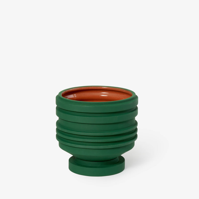 Areaware - Strata Plant Vessel: Green, a sculptural ceramic planter with layered design, inspired by heritage, ideal for enhancing kitchen or home decor.
