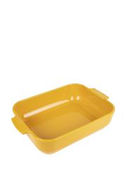 Peugeot | Appolia Rectangular Baking Dish, Saffron Yellow: An empty, yellow ceramic baking dish with small handles, ideal for versatile cooking.