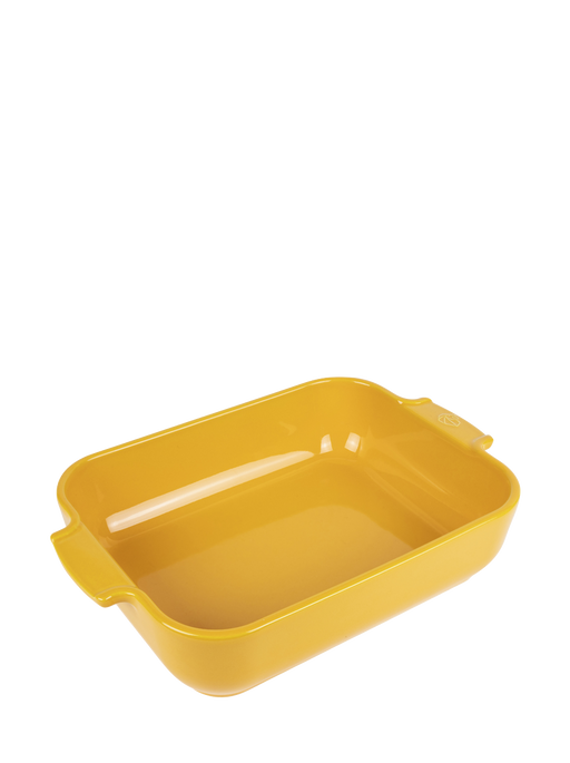 Peugeot | Appolia Rectangular Baking Dish, Saffron Yellow: An empty, yellow ceramic baking dish with small handles, ideal for versatile cooking.