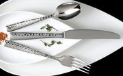 Fortessa | Lucca Faceted 5pc Serving Set featuring a fork, knife, and spoon elegantly arranged on a plate, showcasing refined kitchenware from Athens Cooks.