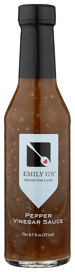 Emily G's Pepper Vinegar Sauce jar with label, featuring bold flavors of jalapeno, sweet onions, and red bell peppers, perfect for enhancing dishes.