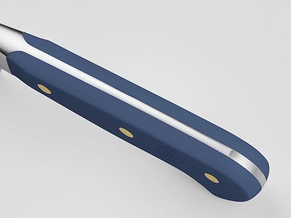Wüsthof Classic 5 Serrated Utility Knife Wild Blueberry features a precision blade, ideal for kitchen use, from Athens Cooks' curated knife collection.