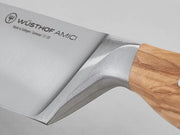 Wüsthof | Amici 6 Chef's Knife featuring a sleek wooden handle and precision blade, ideal for culinary enthusiasts seeking quality kitchen tools from Athens Cooks.