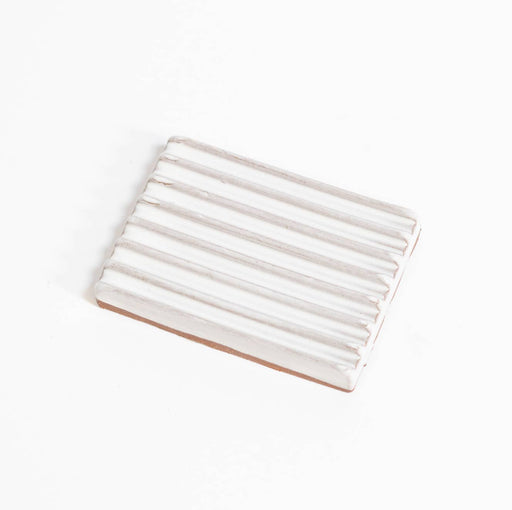 Gravesco Pottery - Soap Dish | White: Handmade ceramic dish with ridged white glaze, terracotta base; keeps soap dry. Crafted in Indianapolis, measures 3x4 inches.