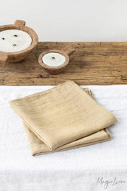 MagicLinen - Set of 2 pure linen napkins on a table, showcasing elegant table decor for versatile dining settings.