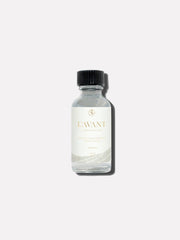 L'AVANT Collective - Fresh Linen Multipurpose Cleaner Refill in a clear glass bottle with black cap, designed for eco-friendly cleaning solutions.